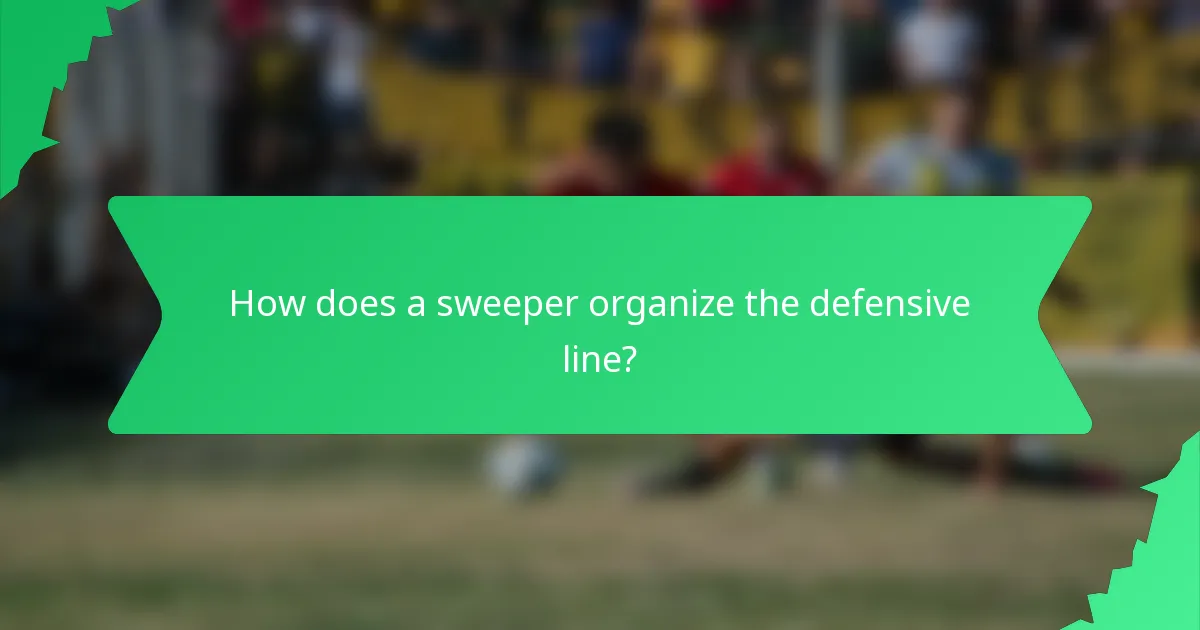 How does a sweeper organize the defensive line?