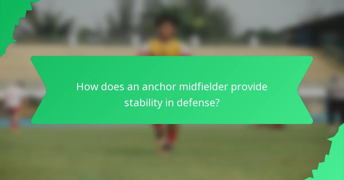 How does an anchor midfielder provide stability in defense?