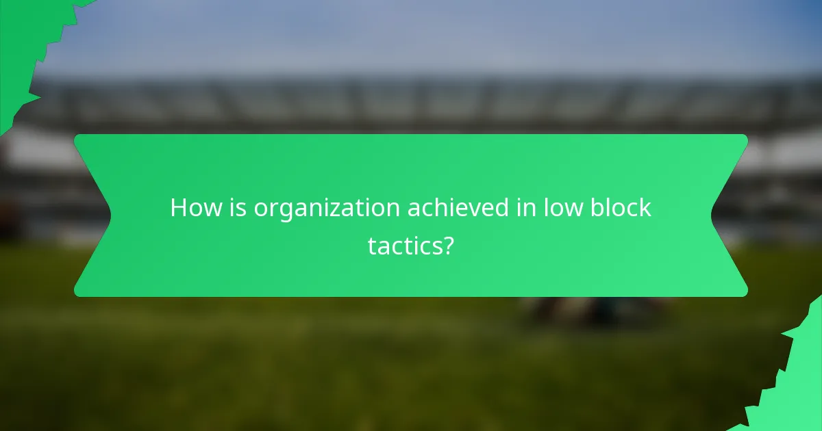 How is organization achieved in low block tactics?